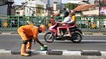 Pasukan Oranye Percantik Pembatas Jalan di Ibu Kota