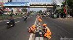 Pasukan Oranye Percantik Pembatas Jalan di Ibu Kota