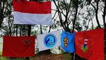 Pengibaran Bendera Merah Putih di Tebing Gunung Bongkok