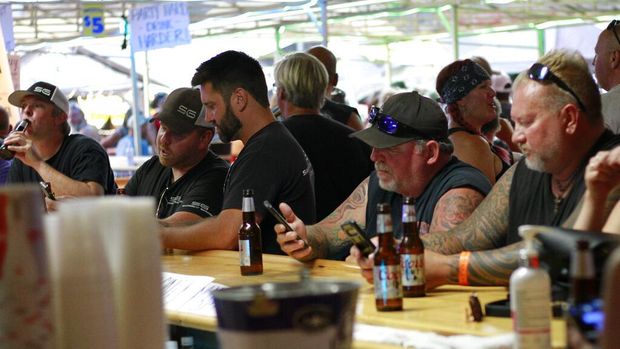 Bikers ride through downtown Sturgis, S.D., on Friday, Aug. 7, 2020. Organizers of the Sturgis Motorcycle Rally expect 250,000 people to visit the town of Sturgis during the 10 day rally.  (AP Photo/Stephen Groves)