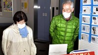 Dilansir dari AP, beragam benda terkait pandemi virus Corona tersebut akan dipamerkan tahun depan.  Kyodo News via AP.
