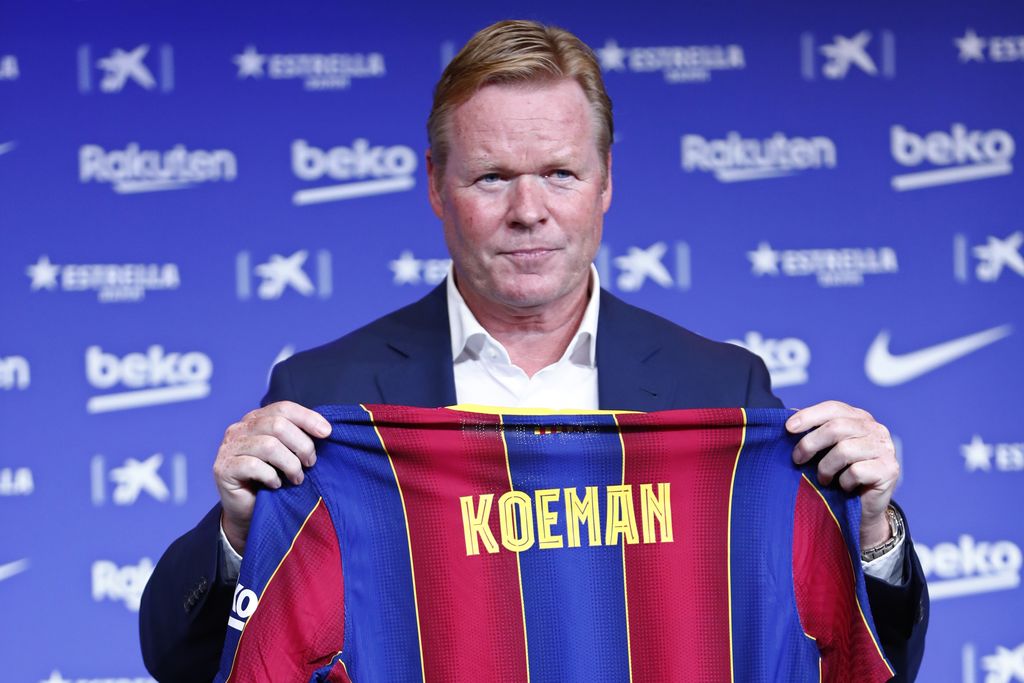 ronald koeman barcelona Ronald Koeman holds up a soccer shirt with his name on it during his official presentation as coach for FC Barcelona in Barcelona, Spain, Wednesday, Aug. 19, 2020. Barcelona officially announced earlier on Wednesday a deal with Koeman to become their coach five days after the team's humiliating 8-2 loss to Bayern Munich in the Champions League quarterfinals. Barcelona says the former defender's deal runs through June 2022. Koeman replaces the fired Quique Setien. (AP Photo/Joan Monfort)