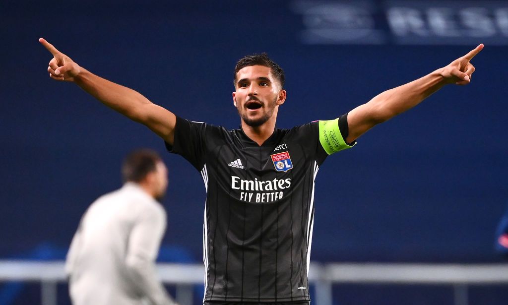 Houssem Aouar LISBON, PORTUGAL - AUGUST 15: Houssem Aouar of Olympique Lyon celebrates following his team's victory in the UEFA Champions League Quarter Final match between Manchester City and Lyon at Estadio Jose Alvalade on August 15, 2020 in Lisbon, Portugal. (Photo by Franck Fife/Pool via Getty Images)