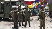Juru bicara kepresidenan Harry Roque mengutuk pemboman itu. Pengeboman pertama dilakukan di dekat alun-alun kota dan katedral di provinsi Sulu Selatan. AP Photo/Nickee Butlangan.