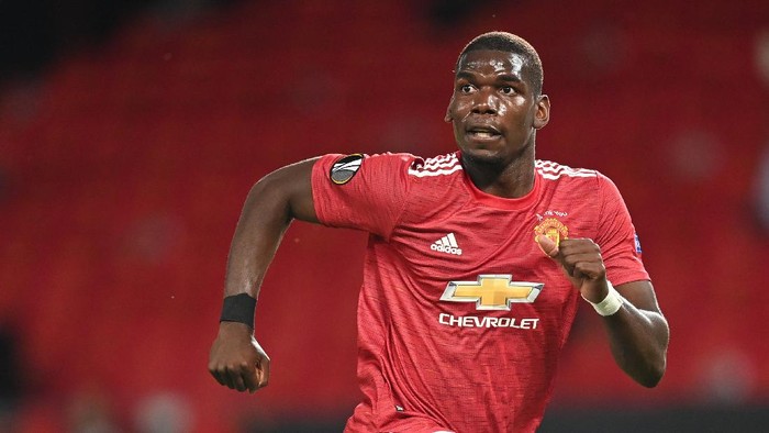 Pogba MANCHESTER, ENGLAND - AUGUST 05: Paul Pogba of Manchester United in action during the UEFA Europa League round of 16 second leg match between Manchester United and LASK at Old Trafford on August 05, 2020 in Manchester, England. (Photo by Michael Regan/Getty Images)