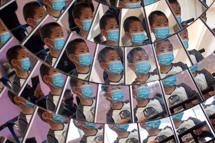 LONDON, ENGLAND - AUGUST 19: Children play in a large mirrored object at the Science Museum on its official re-opening day on August 19, 2020 in London, England. The Science Museum reopens its doors to the public today, nearly five months after the Coronavirus pandemic shut down all public spaces. (Photo by Dan Kitwood/Getty Images)