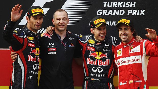 ISTANBUL, TURKEY - MAY 08:  Race winner Sebastian Vettel (2nd right) of Germany and Red Bull Racing celebrates on the podium with second placed Mark Webber (left) of Australia and Red Bull Racing, third placed Fernando Alonso (right) of Spain and Ferrari and Red Bull Racing team mate Mark Ellis (2nd left) following the Turkish Formula One Grand Prix at the Istanbul Park circuit on May 8, 2011 in Istanbul, Turkey.  (Photo by Bryn Lennon/Getty Images)