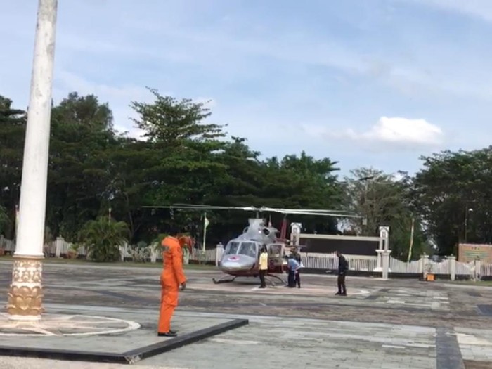 Screenshot viral Ketua DPRD Riau naik heli BNPB disambut orang beratribut Golkar