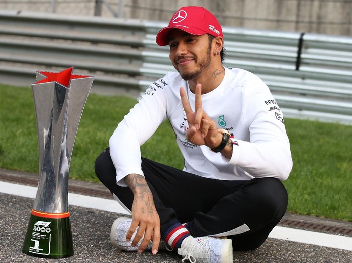 SHANGHAI, CHINA - APRIL 14: Race winner Lewis Hamilton of Great Britain and Mercedes GP poses for a photo with his trophy after the F1 Grand Prix of China at Shanghai International Circuit on April 14, 2019 in Shanghai, China. (Photo by Charles Coates/Getty Images)