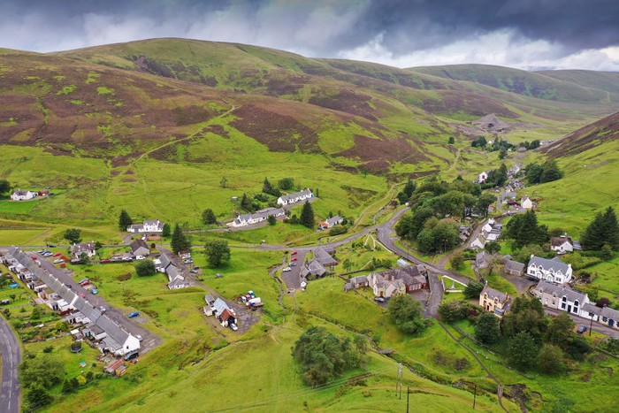 WANLOCKHEAD, SCOTLAND - AUGUST 27: Members of the public are seen walking in Scotland’s highest village on August 27, 2020 in Wanlockhead, Scotland. Following 4 years of negotiations, Wanlockhead Community Trust has agreed to purchase 3,863 acres of land surrounding the village from the Duke of Buccleuchs property company Buccleuch Estates for £1.4 million. Plans for the land include increased opportunities for the local tourism industry, affordable housing and environmental restoration. The trust now has 6 months to secure the necessary funds to complete the transaction. (Photo by Jeff J Mitchell/Getty Images)