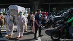 Kampanye Bahaya COVID-19, Peti Mati Diusung di Jalanan