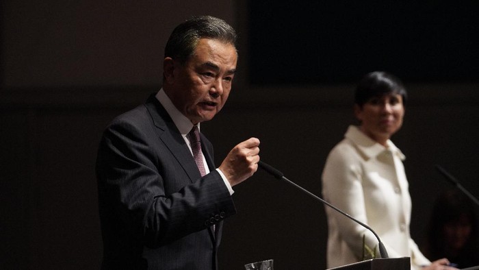 Chinese Foreign Minister Wang Yi, left, and Norwegian Foreign Minister Ine Eriksen Soreide hold a press conference after political talks they had earlier in the evening in Oslo, Thursday, Aug. 27, 2020. The visit is part of a round trip to several European countries. (Heiko Junge/NTB scanpix via AP)