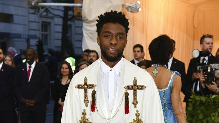 FILE - In this May 7, 2018 file photo, Chadwick Boseman attends The Metropolitan Museum of Arts Costume Institute benefit gala celebrating the opening of the Heavenly Bodies: Fashion and the Catholic Imagination exhibition in New York.  Boseman, who played Black icons Jackie Robinson and James Brown before finding fame as the regal Black Panther in the Marvel cinematic universe, has died of cancer. His representative says Boseman died Friday, Aug. 28, 2020 in Los Angeles after a four-year battle with colon cancer. He was 43. (Photo by Charles Sykes/Invision/AP, File)