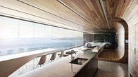 Apa salahnya memanjakan mobil kesayangan dengan pemadangan aduhai. Rumah ini memiliki garasi yang menghadap langsung ke lautan lepas. Kesan minimalis terlihat pada interior garasi yang menyatu dengan ruangan lainnya, di mana dinding kaca membuat pemandangan lautan nan indah bisa dilihat jelas dari dalam. Foto: BMW.com