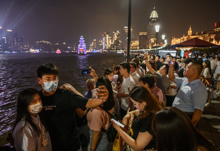 China SHANGHAI, CHINA - AUGUST 29: Boats navigate the Huangpu River as seen from the Oriental Pearl Television Tower in the Pudong district on August 29, 2020 in Shanghai, China. (Photo by Kevin Frayer/Getty Images)