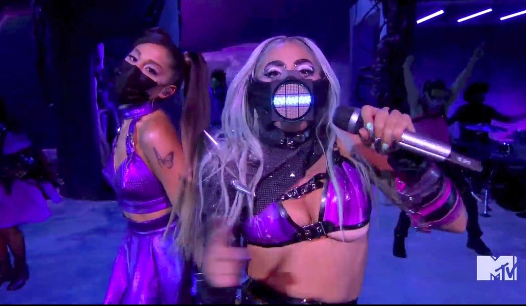 In this video grab issued Sunday, Aug. 30, 2020, by MTV, Ariana Grande, left, and Lady Gaga perform