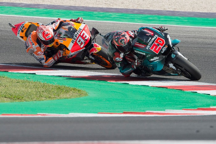 MISANO ADRIATICO, ITALY - SEPTEMBER 15: Fabio Quartararo of France and Petronas Yamaha SRT   leads Marc Marquez of Spain and Repsol Honda Team  during the MotoGP race during the MotoGp of San Marino - Race at Misano World Circuit on September 15, 2019 in Misano Adriatico, Italy. (Photo by Mirco Lazzari gp/Getty Images)