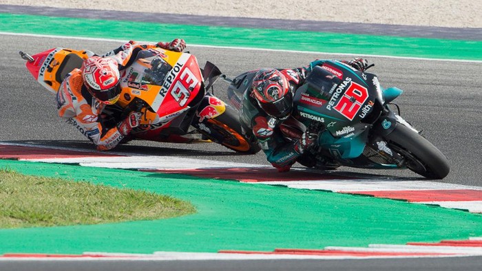 MISANO ADRIATICO, ITALY - SEPTEMBER 15: Fabio Quartararo of France and Petronas Yamaha SRT   leads Marc Marquez of Spain and Repsol Honda Team  during the MotoGP race during the MotoGp of San Marino - Race at Misano World Circuit on September 15, 2019 in Misano Adriatico, Italy. (Photo by Mirco Lazzari gp/Getty Images)