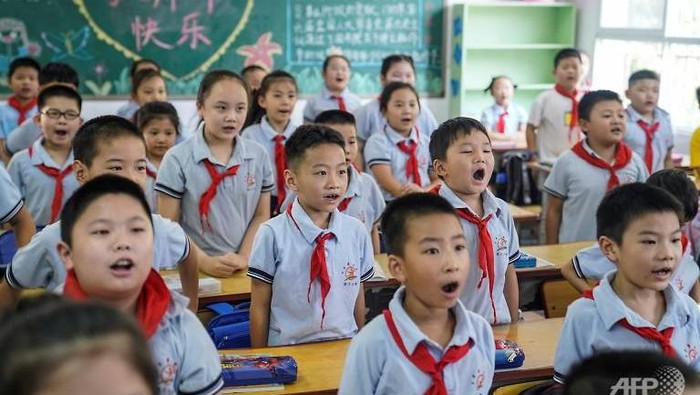 Siswa di Wuhan, China sudah mulai masuk kelas lagi (AFP Photo)