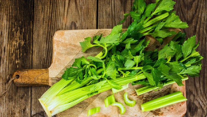 Bunch of fresh celery stalk with leaves. Studio Photo