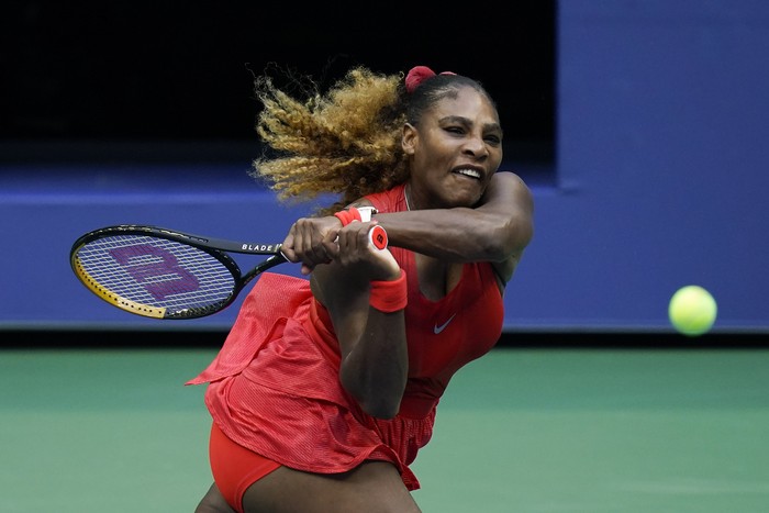 Serena Williams, of the United States, returns a shot to Kristie Ahn, of the United States, during the first round of the US Open tennis championships, Tuesday, Sept. 1, 2020, in New York. (AP Photo/Seth Wenig)