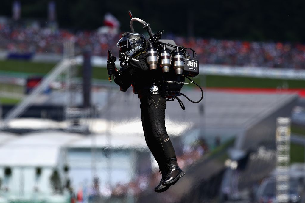 SPIELBERG, AUSTRIA - JULY 01: An entertainer with a jetpack performs before the Formula One Grand Prix of Austria at Red Bull Ring on July 1, 2018 in Spielberg, Austria.  (Photo by Mark Thompson/Getty Images)