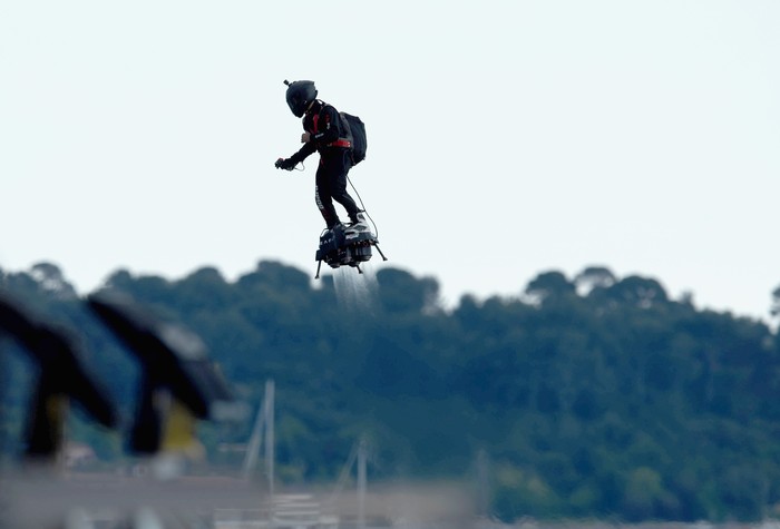 CANNES, FRANCE - MAY 15:  A man jetpacks over the screening of 
