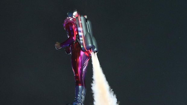 LONDON, ENGLAND - JULY 27: A performer with a jetpack takes part in the Opening Ceremony of the London 2012 Olympic Games at the Olympic Stadium on July 27, 2012 in London, England.  (Photo by Cameron Spencer/Getty Images)