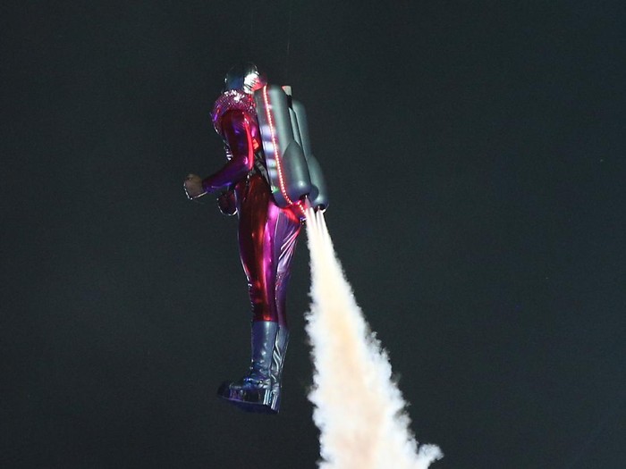 LONDON, ENGLAND - JULY 27: A performer with a jetpack takes part in the Opening Ceremony of the London 2012 Olympic Games at the Olympic Stadium on July 27, 2012 in London, England.  (Photo by Cameron Spencer/Getty Images)