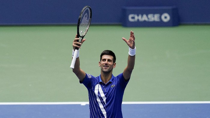 Novak Djokovic, of Serbia, reacts after defeating Kyle Edmund, of Great Britain, during the second round of the US Open tennis championships, Wednesday, Sept. 2, 2020, in New York. (AP Photo/Seth Wenig)