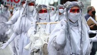 Kelompok aktivis anti-perubahan iklim, Extinction Rebellion, menggelar aksi unjuk rasa selama sepuluh hari di Inggris. Hollie Adams/Getty Images  