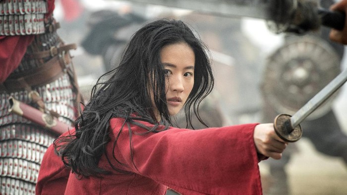 This image released by Disney shows Yifei Liu in the title role of Mulan. (Jasin Boland/Disney via AP)