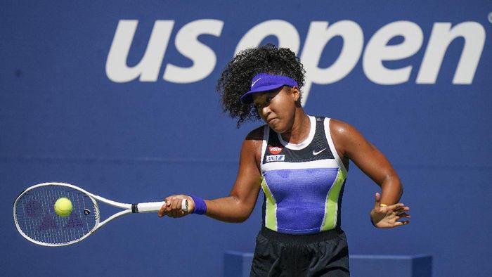 Naomi Osaka Naomi Osaka, of Japan, returns a shot to Marta Kostyuk, of the Ukraine, during the third round of the US Open tennis championships, Friday, Sept. 4, 2020, in New York. (AP Photo/Seth Wenig)