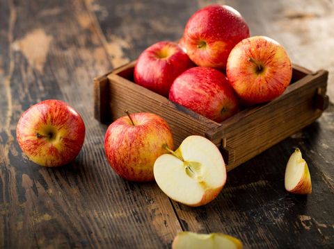apple isolated on wood background