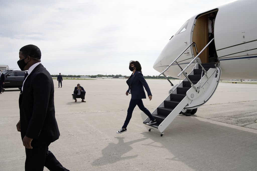 Democratic vice presidential candidate Sen. Kamala Harris, D-Calif., waves before boarding her plane after a campaign stop Monday, Sept. 7, 2020, in Milwaukee. (AP Photo/Morry Gash)
