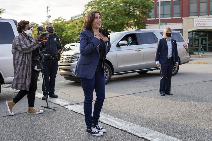 Democratic vice presidential candidate Sen. Kamala Harris, D-Calif., waves before boarding her plane after a campaign stop Monday, Sept. 7, 2020, in Milwaukee. (AP Photo/Morry Gash)