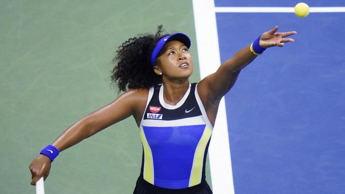 Naomi Osaka, of Japan, serves to Shelby Rogers, of the United States, during the quarterfinal round of the US Open tennis championships, Tuesday, Sept. 8, 2020, in New York. (AP Photo/Frank Franklin II)
