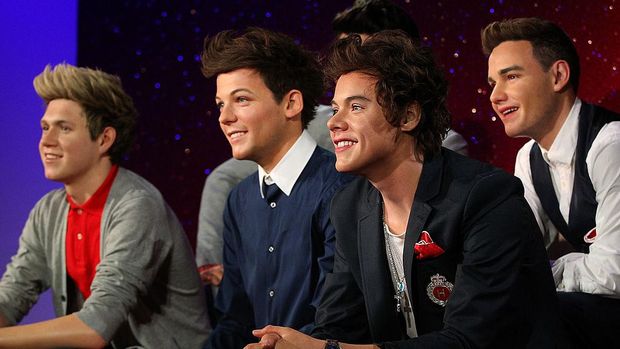 Patung One Direction diperkenalkan di museum Madame Tussauds, London, Inggris, pada 2013. Peresmian patung dihadiri para personel aslinya.