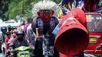 Potret Pengamen Ondel-ondel yang Berjuang Taklukkan Kerasnya Ibu Kota
