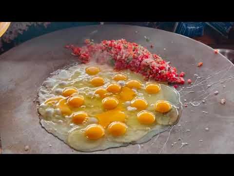 Unik! Nasi Goreng Kaki Lima Ini Dimasak Pakai Cola