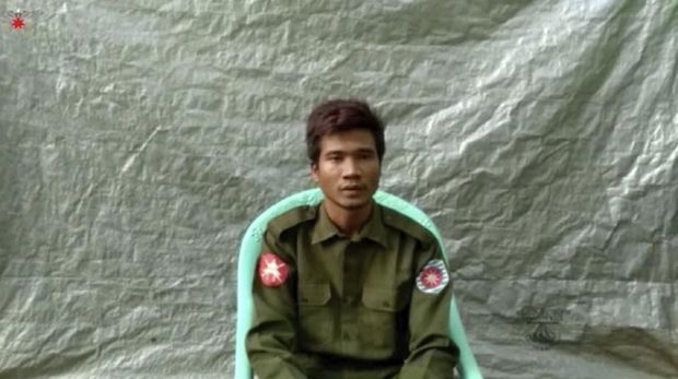 In this image taken from video provided by the Arakan Army, Private Zaw Naing Tun provides a video testimony from an undisclosed location somewhere in Myanmar on July 8, 2020. Two soldiers who deserted from Myanmar's army have testified on video that they were instructed by commanding officers to 