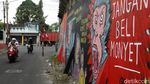 Mural Anti Perdagangan Hewan Hiasi Pasar Satwa Yogyakarta
