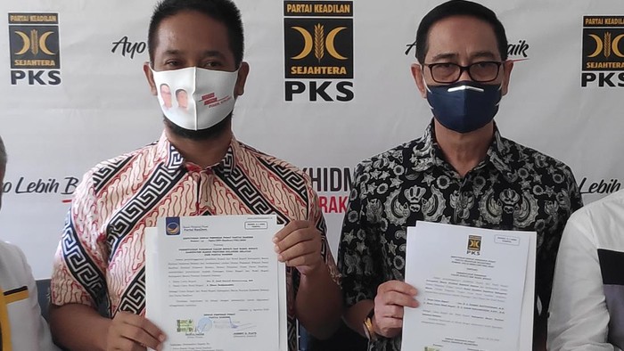 Pasangan Bakal Calon Bupati Maros, Harmil Mattorang (kiri) bersama Wakilnya, Ilham Nadjamuddin.