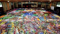 Berjudul The Journey of Humanity, karya ini secara kasar berukuran setara dengan empat lapangan basket regulasi NBA.