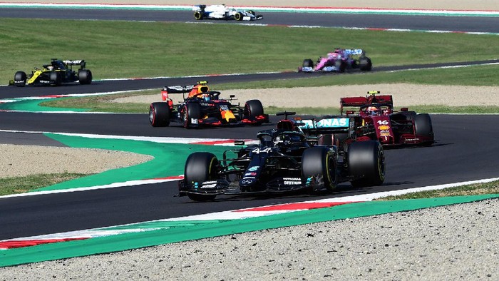 SCARPERIA, ITALY - SEPTEMBER 13: Lewis Hamilton of Great Britain driving the (44) Mercedes AMG Petronas F1 Team Mercedes W11 leads Charles Leclerc of Monaco driving the (16) Scuderia Ferrari SF1000 on track during the F1 Grand Prix of Tuscany at Mugello Circuit on September 13, 2020 in Scarperia, Italy. (Photo by Jenifer Lorenzini - Pool/Getty Images)
