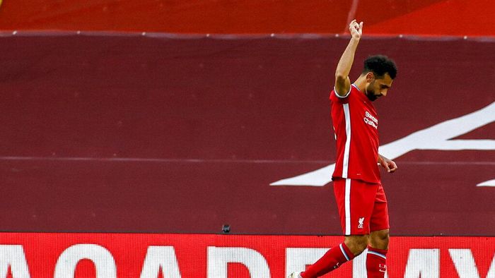Mohamed Salah Liverpools Mohamed Salah celebrates after he scored his sides third goal during the English Premier League soccer match between Liverpool and Leeds United, at the Anfield stadium, in Liverpool, Saturday, Sept. 12, 2020. (Phil Noble, Pool via AP)