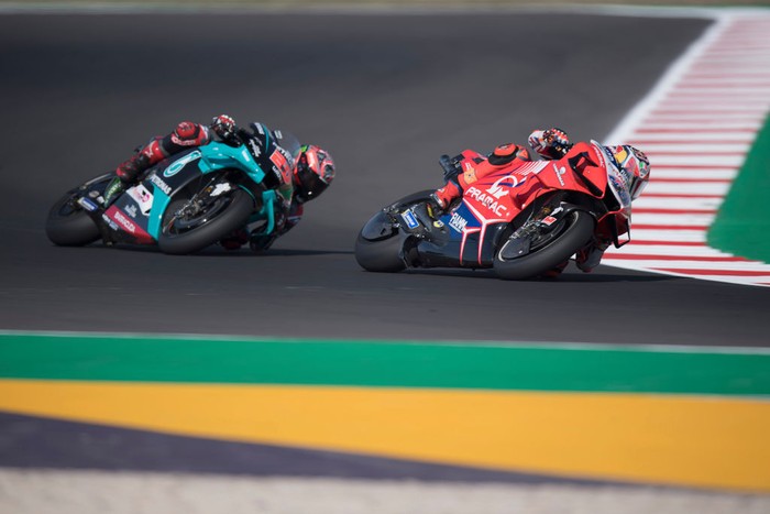 MISANO ADRIATICO, ITALY - SEPTEMBER 11: Jack Miller of Australia and Pramac Racing leads Fabio Quartararo of France and Petronas Yamaha SRT during the MotoGP Of San Marino - Free Practice at Misano World Circuit on September 11, 2020 in Misano Adriatico, Italy. (Photo by Mirco Lazzari gp/Getty Images)