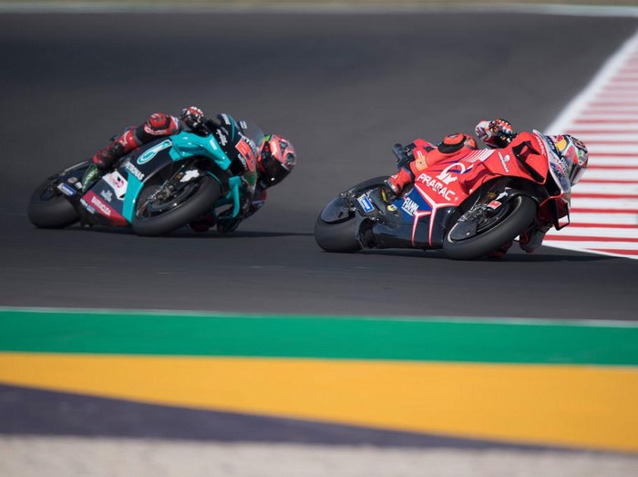 MISANO ADRIATICO, ITALY - SEPTEMBER 11: Jack Miller of Australia and Pramac Racing leads Fabio Quartararo of France and Petronas Yamaha SRT during the MotoGP Of San Marino - Free Practice at Misano World Circuit on September 11, 2020 in Misano Adriatico, Italy. (Photo by Mirco Lazzari gp/Getty Images)