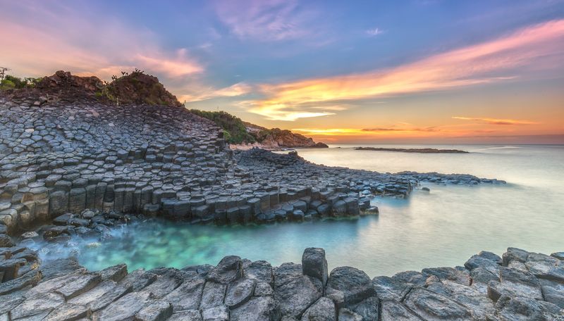 Sun setting over the famous Giants Causeway, Northern Ireland.