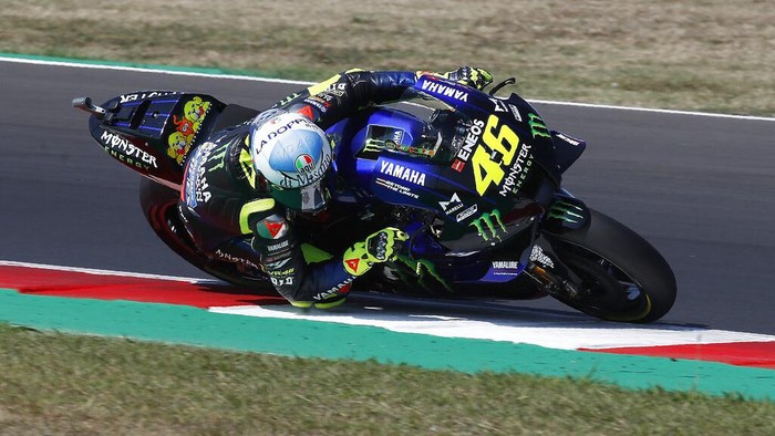 MotoGP rider Valentino Rossi of Italy takes a curve during the San Marino Motorcycle Grand Prix at the Misano circuit in Misano Adriatico, Italy, Sunday, Sept. 13, 2020. (AP Photo/Antonio Calanni)